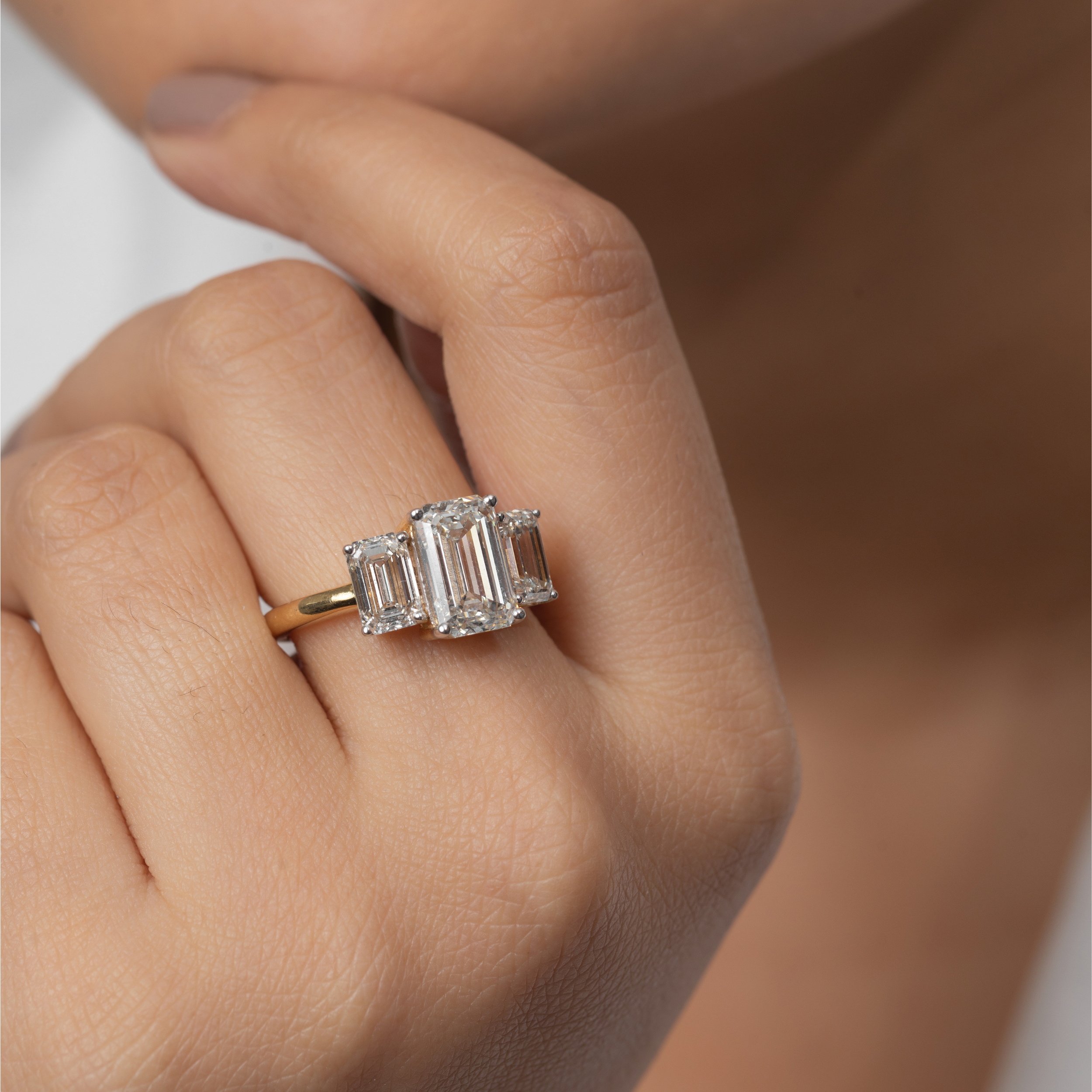 Three Stone Emerald Cut Ring