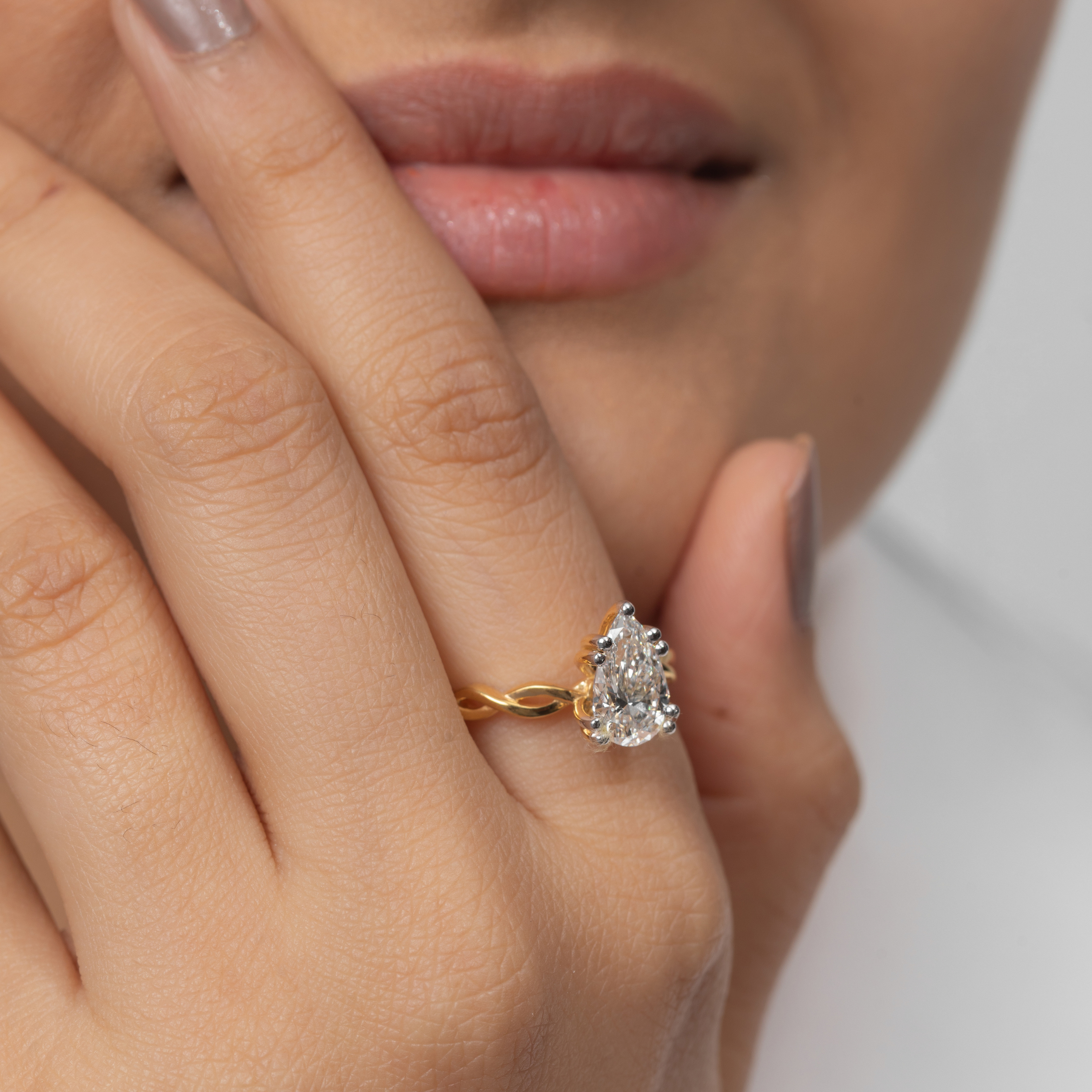 Solitaire Pear Loop Band Ring