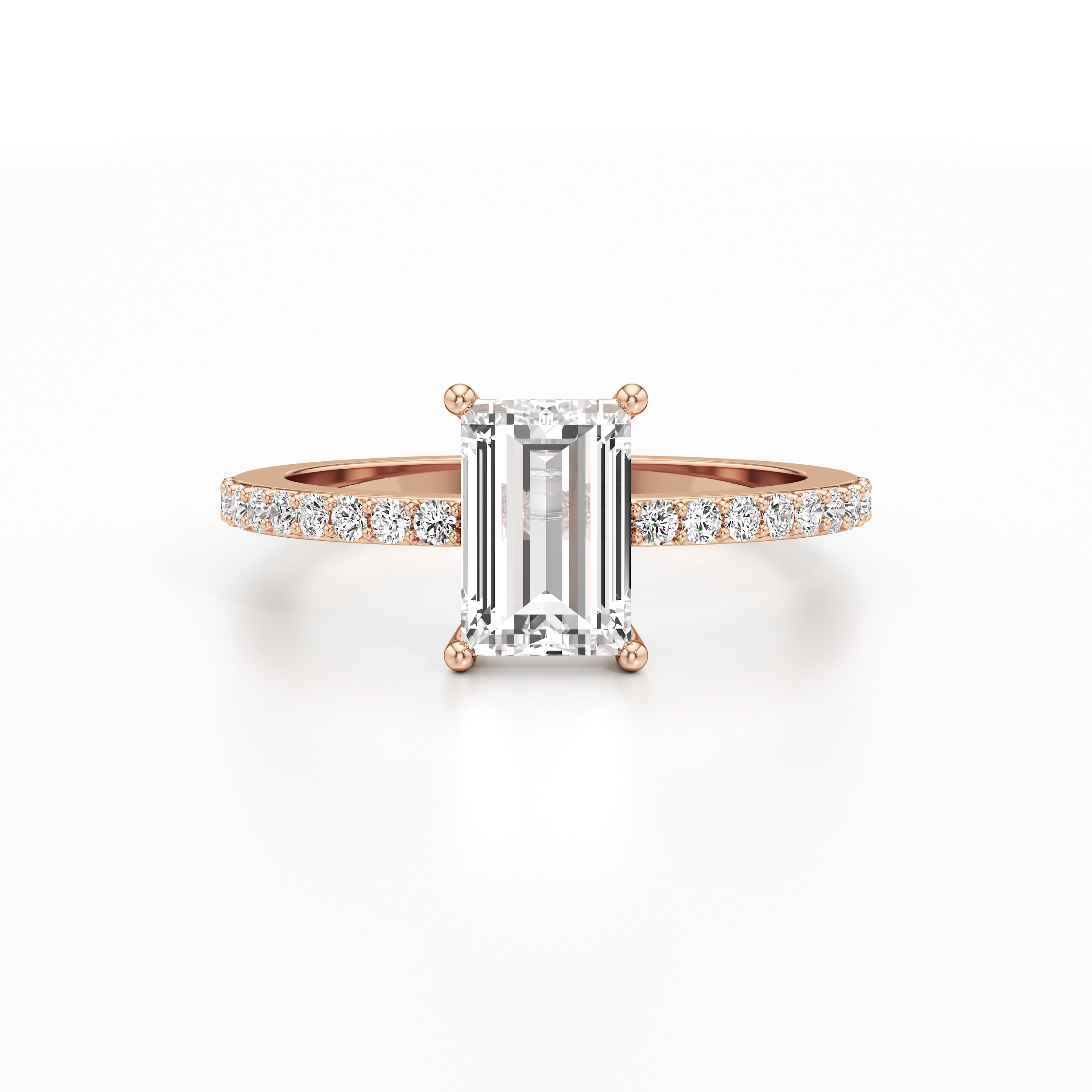 Bedazzled Solitaire Emerald Ring